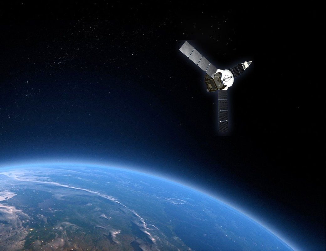 A satellite orbiting above the Earth (composite image)